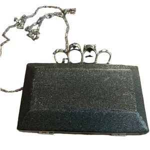 Charming Charlie brass knuckles handle purse